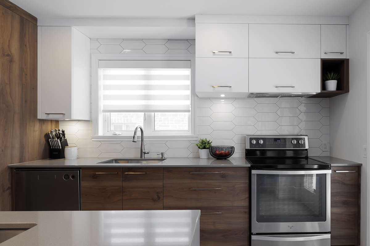 Image of a kitchen with a steel countertop.