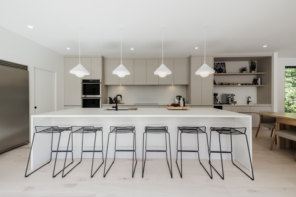 luxury beige and white kitchen with large island signed Rochon