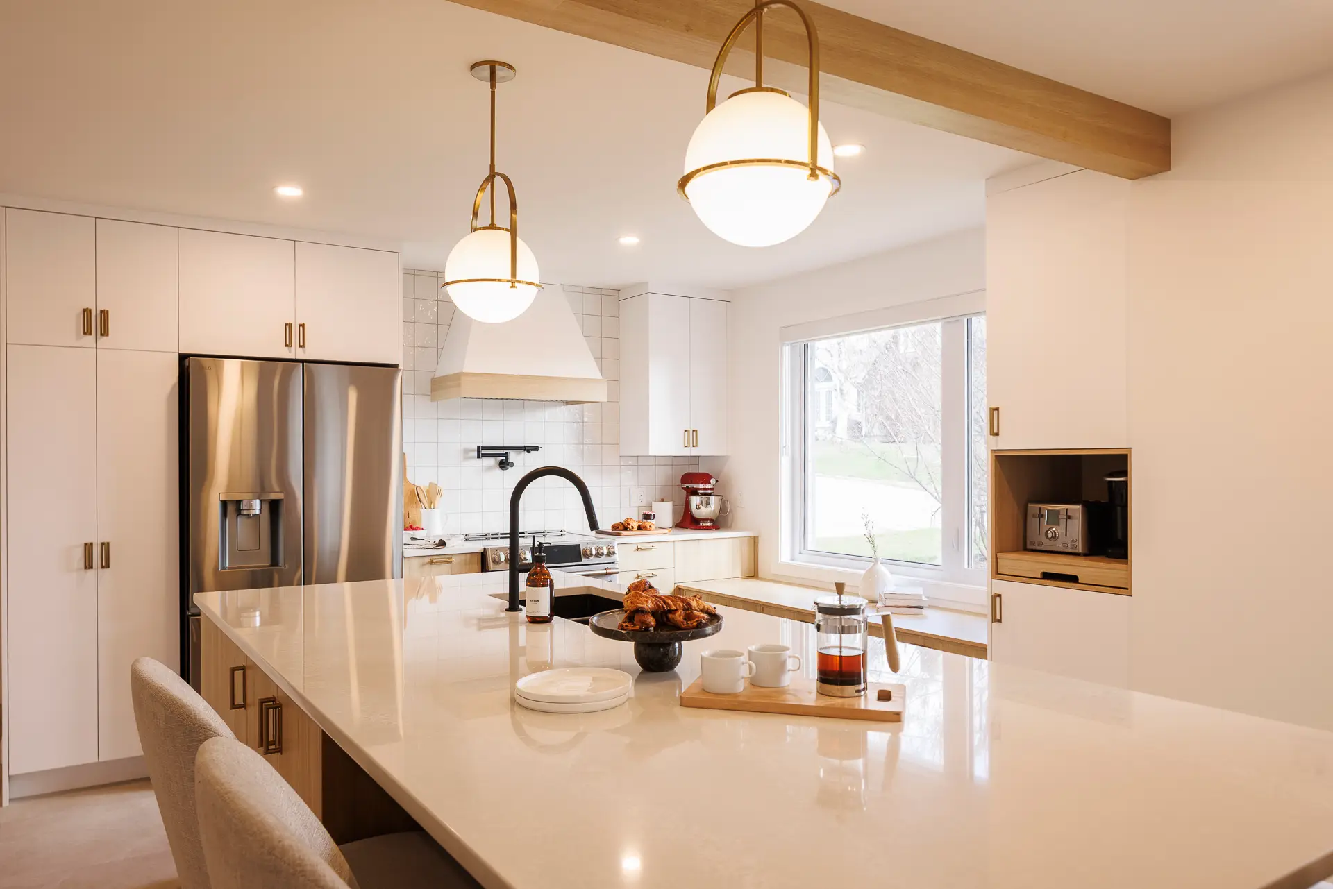 View of a Rochon kitchen with a quartz countertop